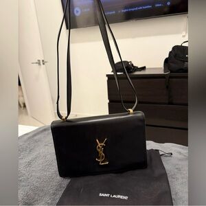 Saint Laurent Elegant Black Crossbody with Gold Accent